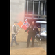 Capitol Police Officer, Greatest of All Time, Wardell Jackson stopping Confederate-flag wavers in front of the Mississippi State Museum (Chris Blount via Facebook)